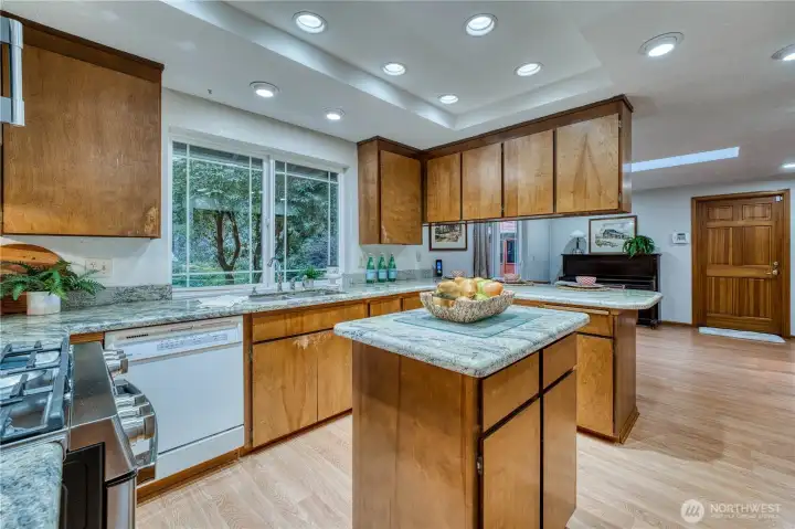 Plenty of cabinets and counter space in this kitchen and lots of newer can lighting.