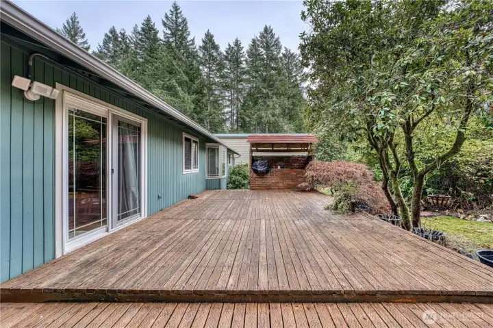 Grab your favorite beverage and relax on the deck in this peaceful setting.