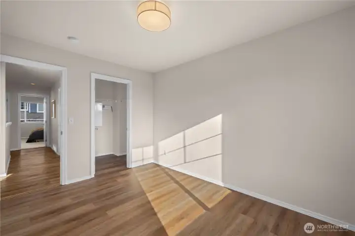 Upper level bedroom 5 of 5 has LVP flooring. Perfect for crafting, yoga, gym or bedroom!