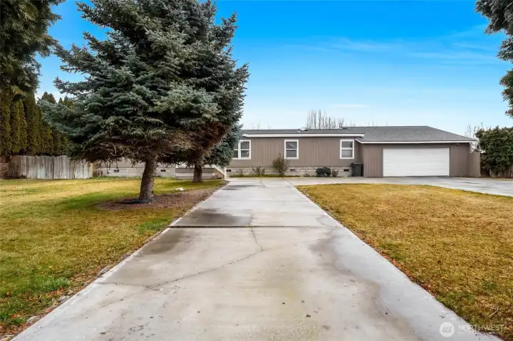 You'll enjoy the circular driveway in front and the two-car garage.