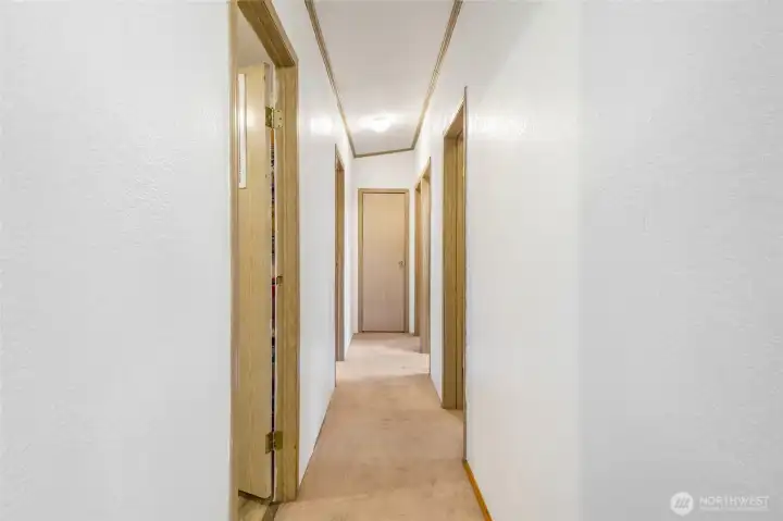 The three other bedrooms are down the hall from the family room.  Laundry/utility room is through the first door on the left.