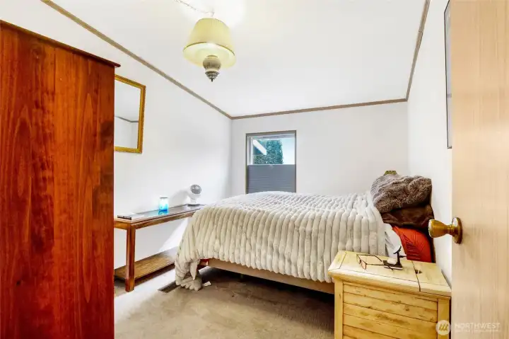 Bedroom #4 is at the front of the house and has a walk-in closet.