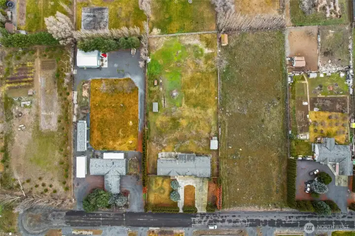 The home in the middle is this property.  There is a lot of room for parking an RV in the front yard to the sides.