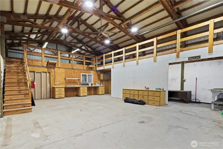 This is the inside of the shop - LOTS of room for anything!  The little window looks into the ADU space.