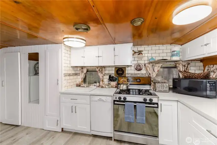 Kitchen is designed around a 1950s travel trailer