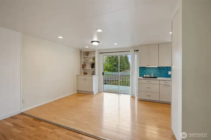 Kitchen with eating area-built ins next to slider