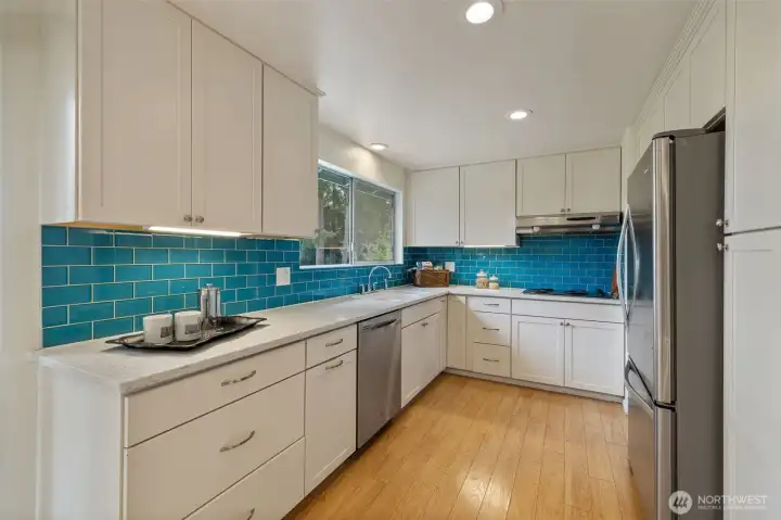 Updated Kitchen with S/S Pkg of appliances-Quartz countertops-Glass backsplash