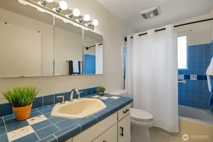 Main Bath Upstairs with tub/shower, ceramic tile counters