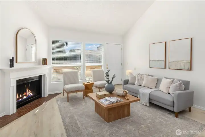 Vaulted ceilings flood the home with light