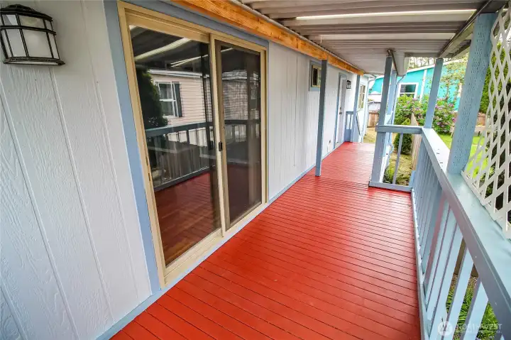 The side porch leads to the back yard.
