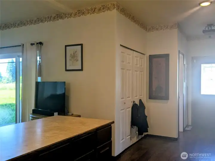 Kitchen area, side door goes to garage, the two door open up to laundry room.