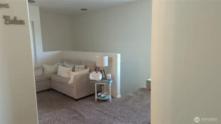 The upstairs landing is spacious. Be creative with this space.