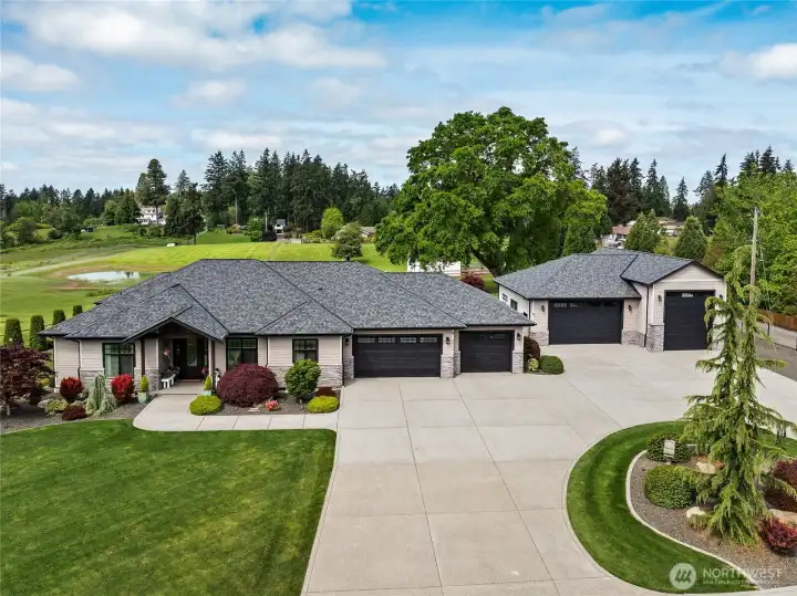 Beautiful residence and detached shop set amid thoughtfully maintained grounds that highlight the property’s exceptional care and refined character. Beautiful residence and detached shop set amid thoughtfully maintained grounds that highlight the property’s exceptional care and refined character.