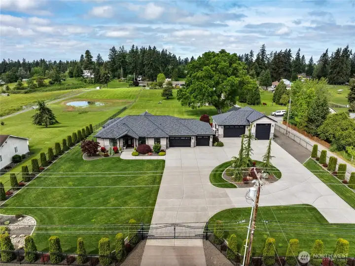 A private automatic gated entry presents an impressive and secure arrival experience that sets the tone for the refined property beyond. A private automatic gated entry presents an impressive and secure arrival experience that sets the tone for the refined property beyond.