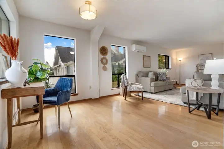 Another perspective of the living room, offering a comfortable setting for everyday living and entertaining. Another perspective of the living room, offering a comfortable setting for everyday living and entertaining.