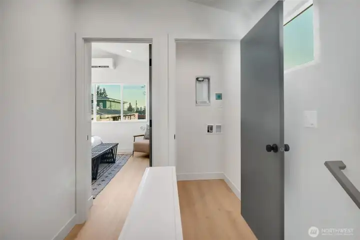 Washer and dryer hook-ups are located at the top of the stairs on the second level. Washer and dryer hook-ups are located at the top of the stairs on the second level.