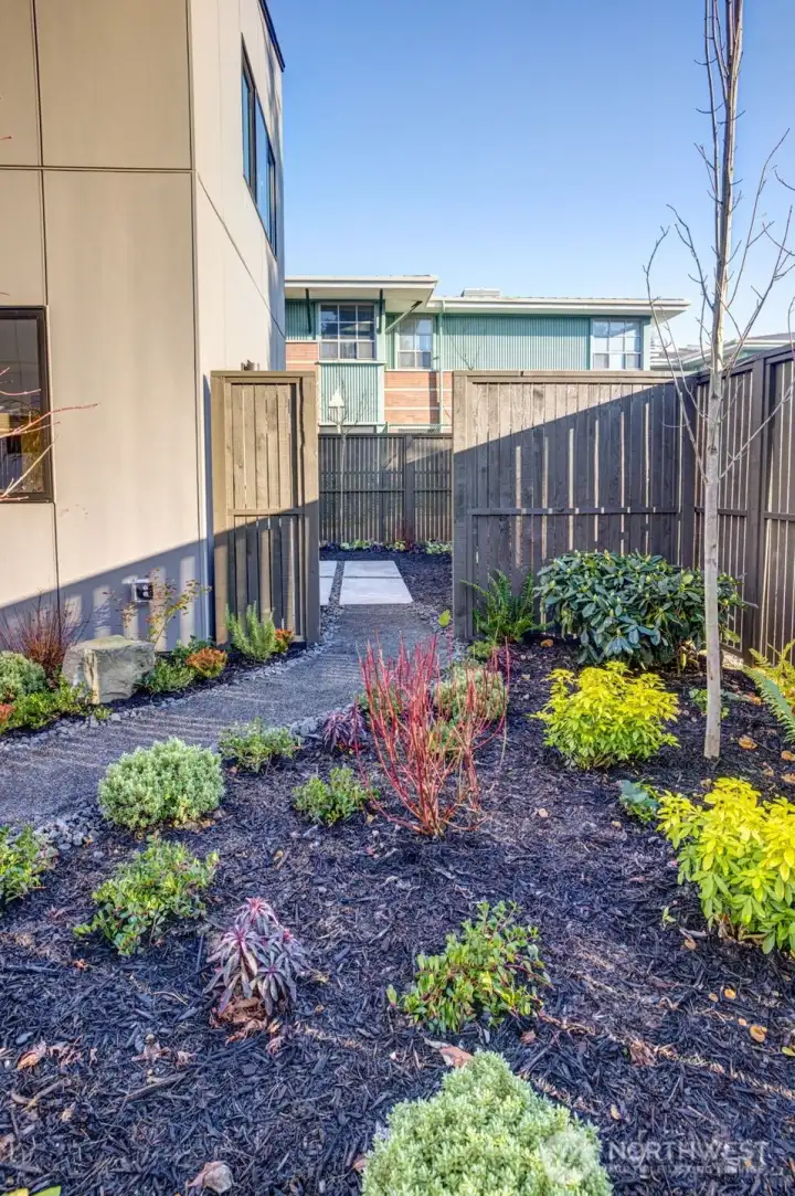 Mindful low-maintenance plantings enhance the site with natural lines and year-round color. Mindful low-maintenance plantings enhance the site with natural lines and year-round color.