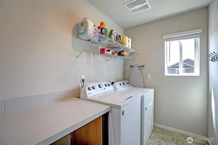 Laundry room with folding table