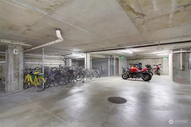 Locked bike storage area as well as motorcycle parking.
