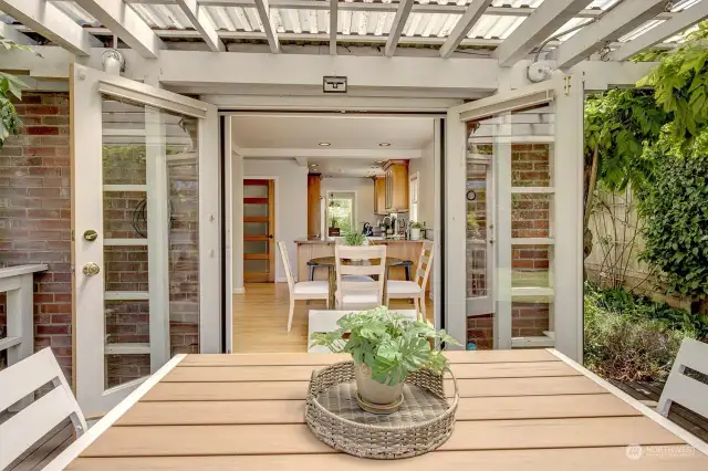 French doors lead to covered deck.