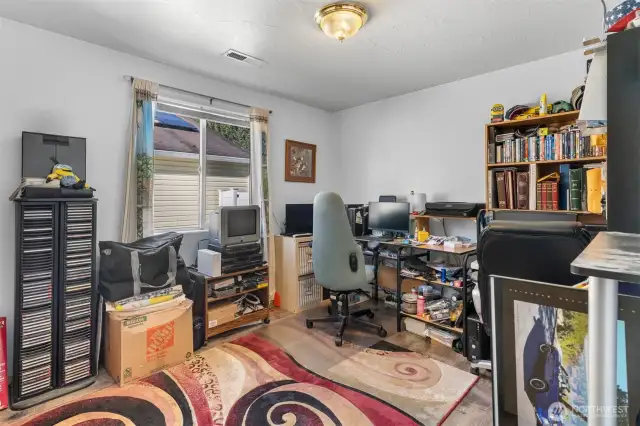 Second guest bedroom is currently being used as a home office.