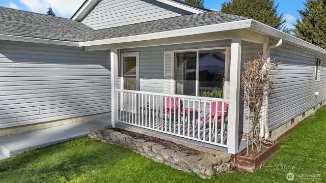 Pathway leads from driveway to front entry.