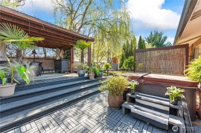 covered deck and hot tub