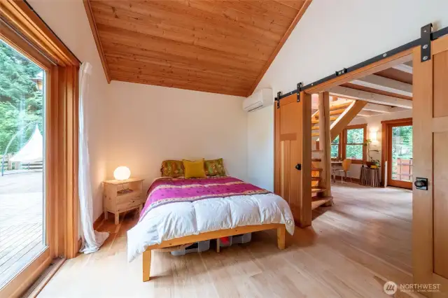 Sliding barn doors give you privacy from the main rooms