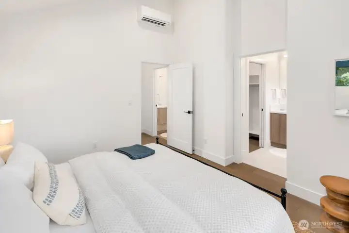 Primary suite with en suite 3/4 bath and walkin closet.