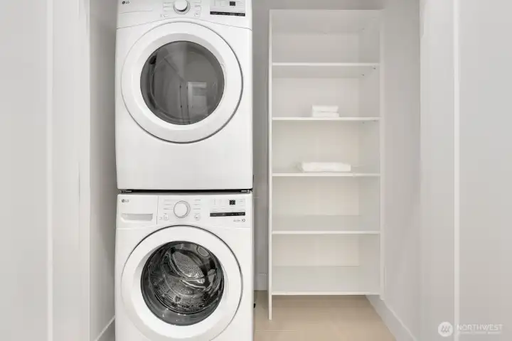 Home comes with a stacking washer/dryer.