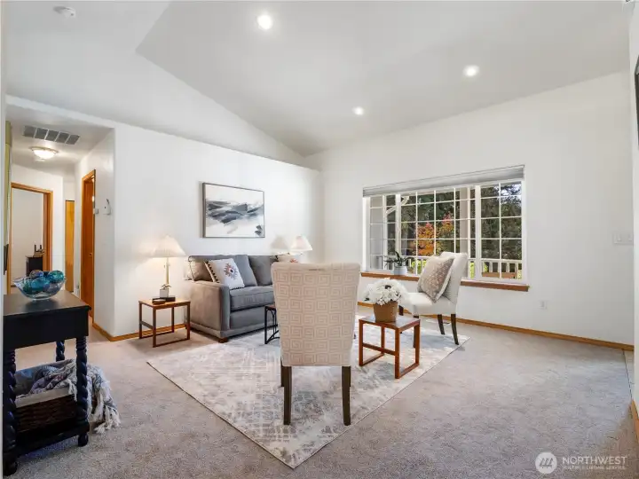 The home has new carpet and vinyl flooring throughout.