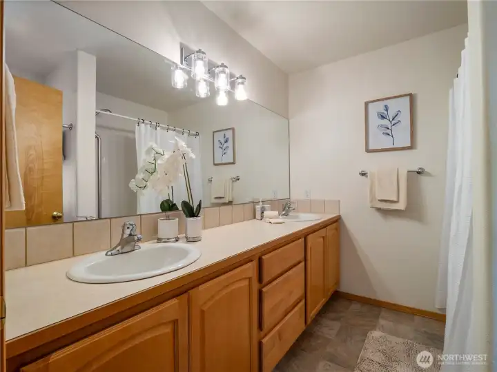 The primary full bathroom has double sinks so getting ready in the morning is a breeze.