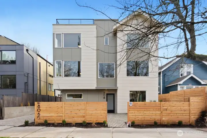 Home is street facing with a fully fenced and level front yard.
