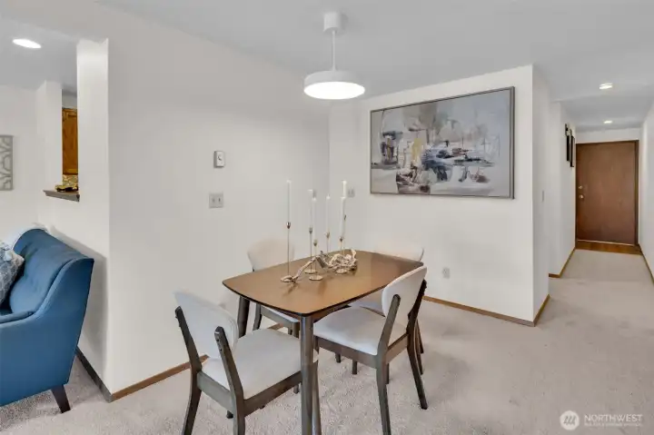Nice dining area with new chic light fixture