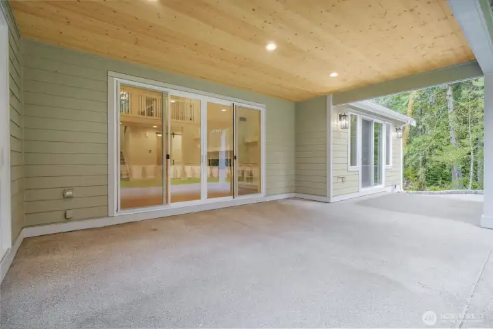 Covered patio on backside of home