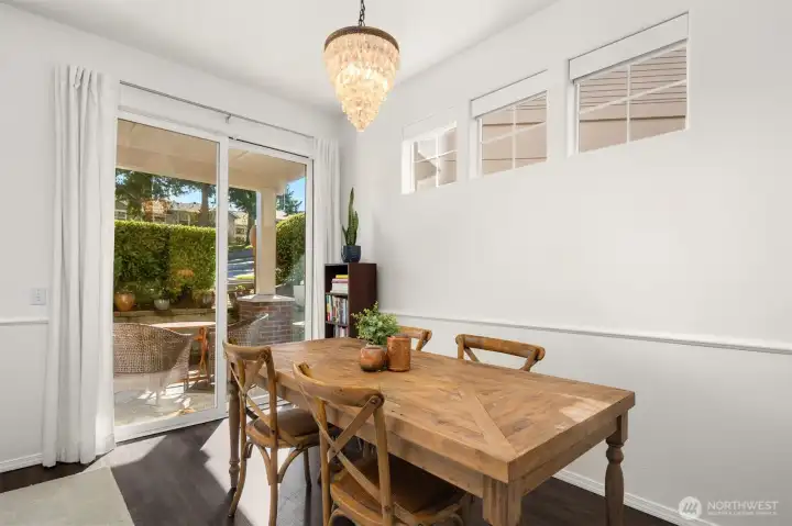 Spacious dining room with slider to the patio.