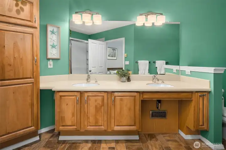 Spacious bath with double vanity.