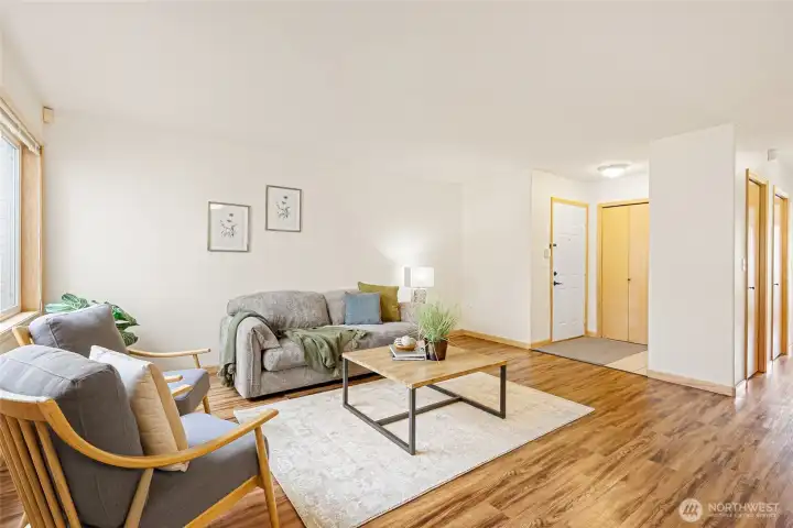 Large living room, tiled entry and large coat closet.