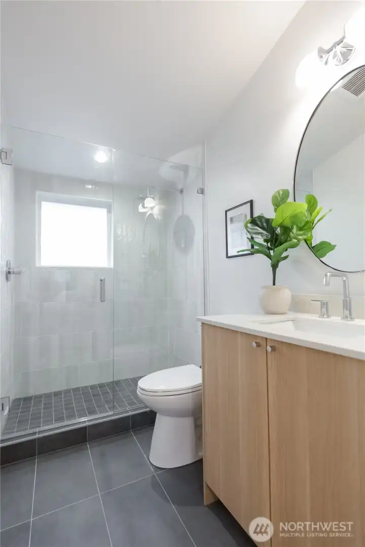 Primary bath; custom tile work and frameless glass shower