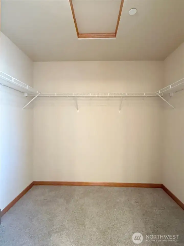 Walk-in closet in primary suite