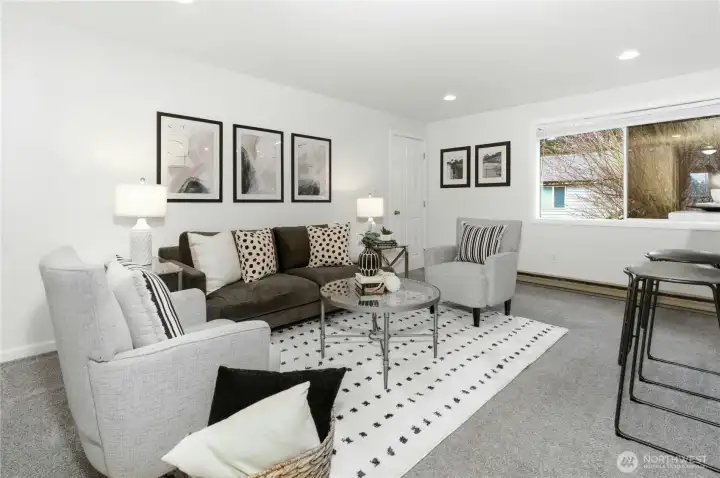 Great room living room is oversized for multiple uses.