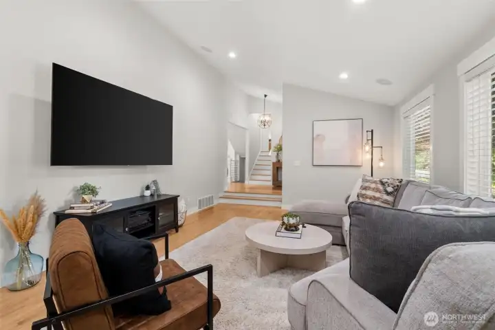 Spacious living room filled with natural light. Spacious living room filled with natural light.