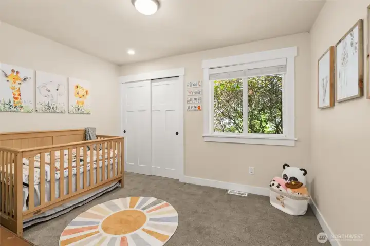 Additional bedroom on the same level as the primary suite, perfect for a nursery or office Additional bedroom on the same level as the primary suite, perfect for a nursery or office