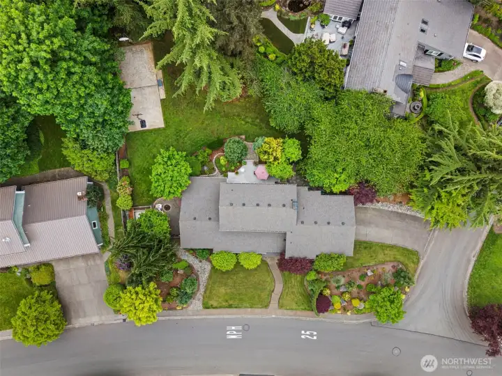 aerial view featuring the home’s generous lot and surrounding natural beauty. aerial view featuring the home’s generous lot and surrounding natural beauty.