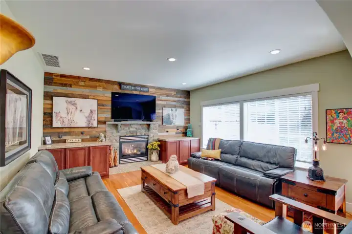 Living room #2 with built-in and cozy gas fireplace.