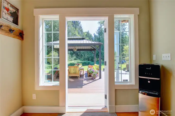 Door off the kitchen onto the incredible back deck/patio