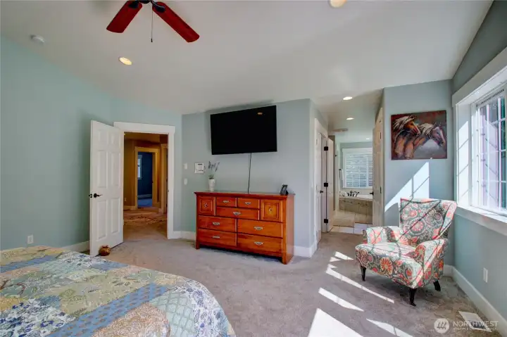 Primary suite with dual closets (one of them is a walk-in) and access to 5 piece ensuite with walk-in shower and jetted tub.