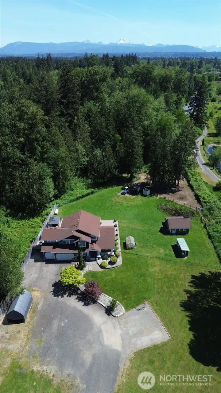 This picture depicts appox 1.5 acres of yard, the rest of the 7 acres are in the back trees.