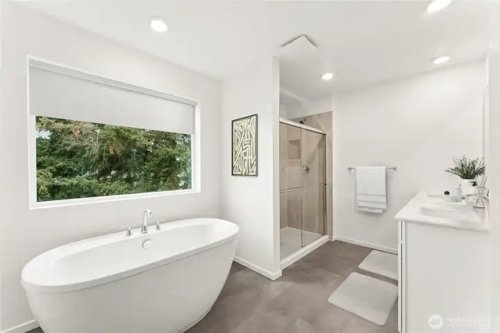 Spa like bathroom features an elegant free-standing tub, tiled shower, and quartz countertops. Virtually Staged. For representational purposes ONLY. Elevation, Location, and Colors WILL vary. Spa like bathroom features an elegant free-standing tub, tiled shower, and quartz countertops. Virtually Staged. For representational purposes ONLY. Elevation, Location, and Colors WILL vary.