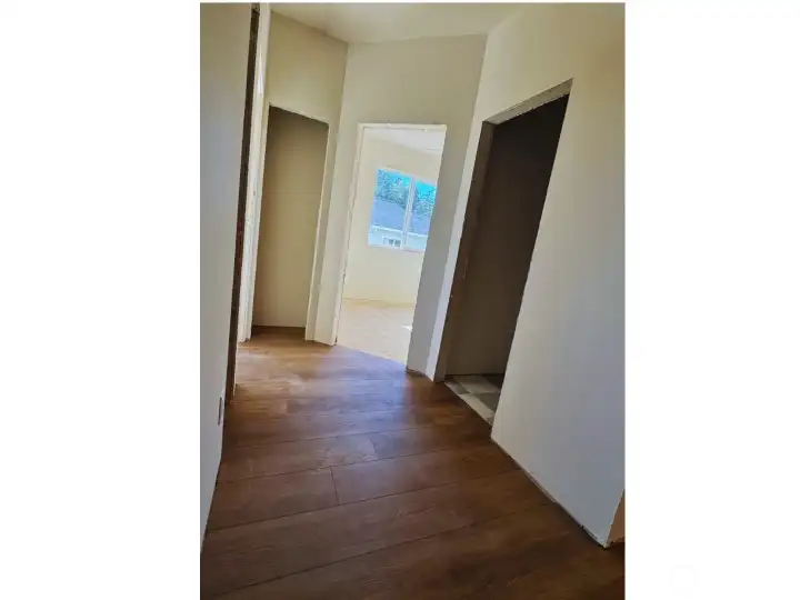 Just to left of front entry, hall to first 2 bdrms, full bathroom & closet Just to left of front entry, hall to first 2 bdrms, full bathroom & closet